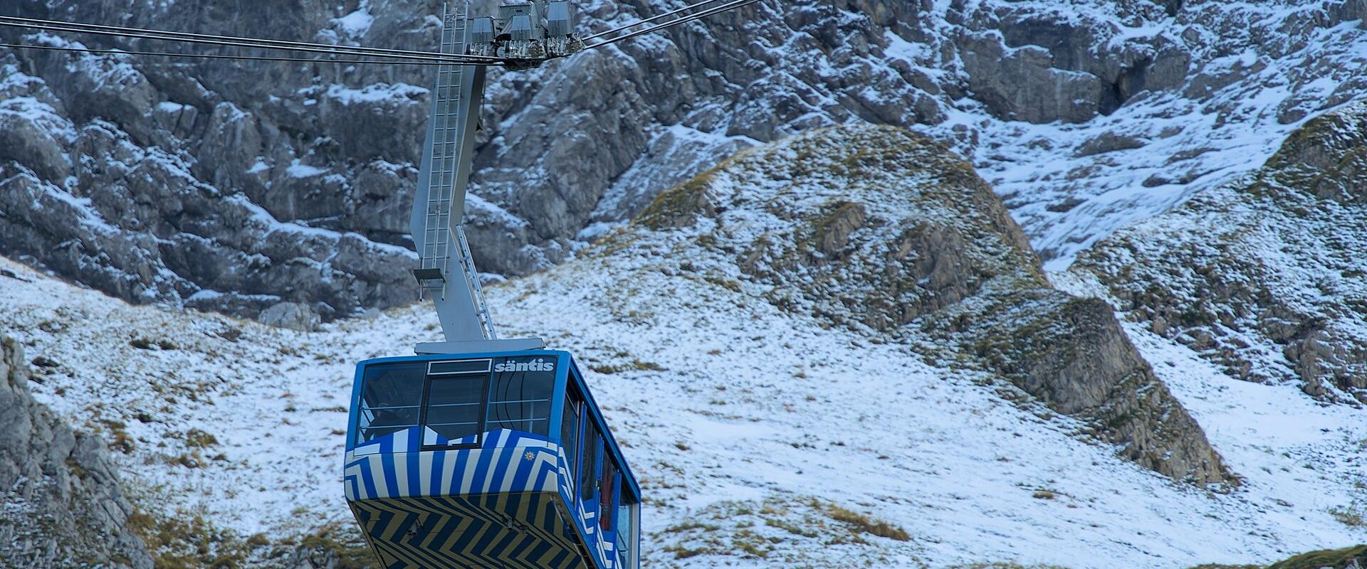 The Säntis cable car climbing the rock face above Schwägalp