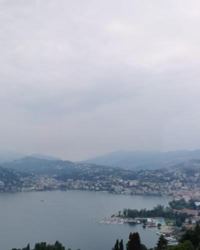 CHE — TI — Bezirk Lugano — Stadt Lugano — Sentiero trona 54 (view of Lugano and its lake · pano) — 2024-05-14 Mattes