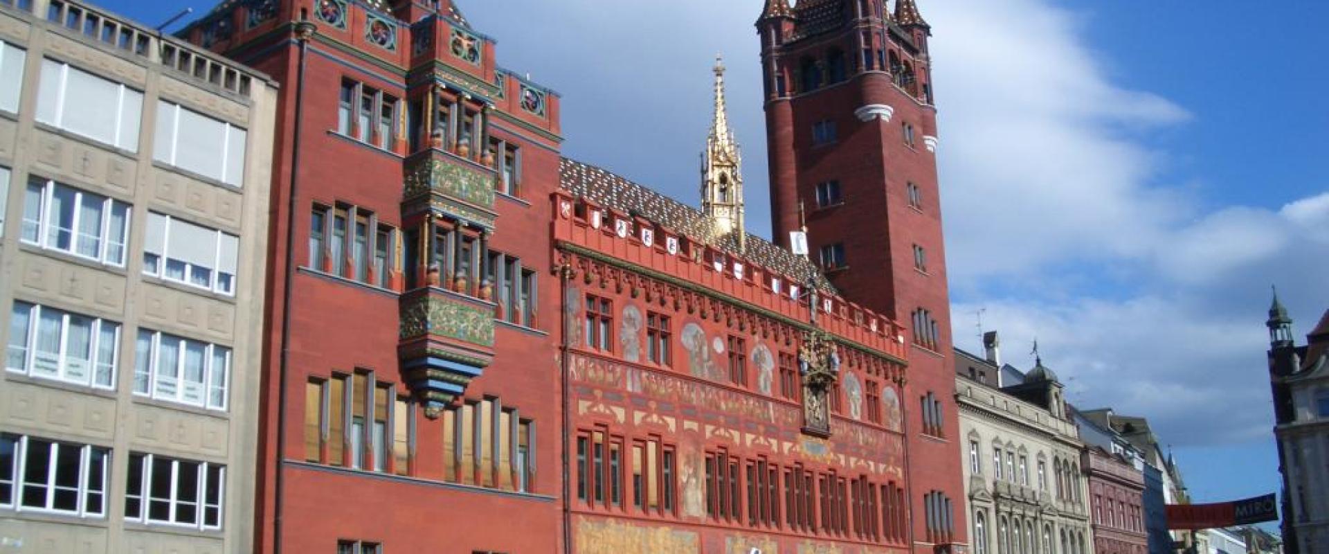 The red-painted Basel Town Hall on the Marktplatz