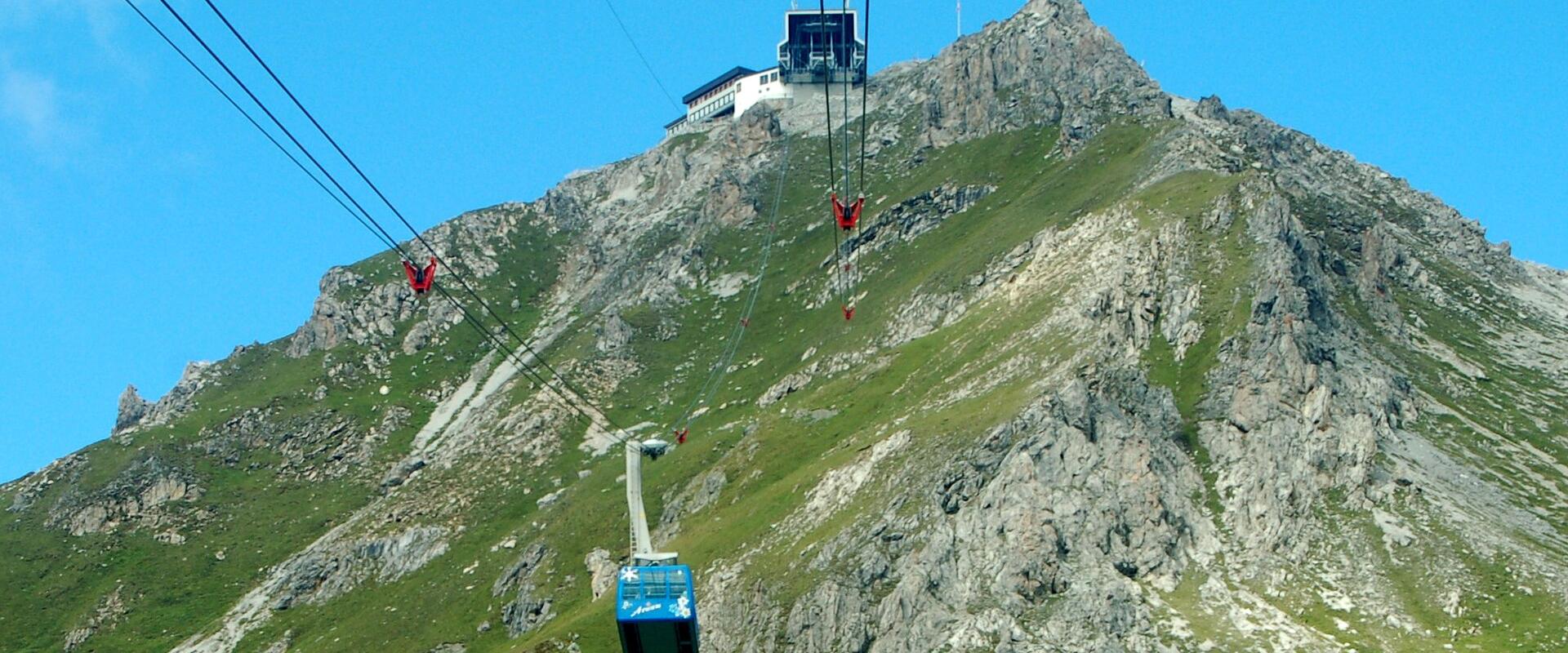 Cable car climbing to the Weisshorn summit above Arosa