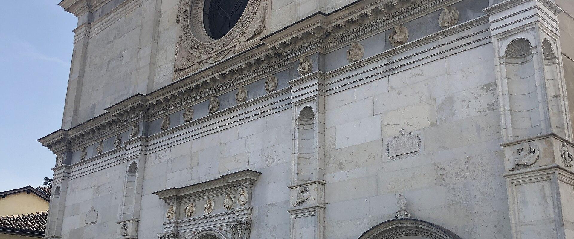 The white Renaissance facade of Lugano Cathedral of San Lorenzo