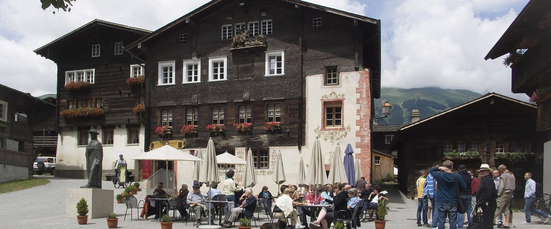 The old wooden houses around the village square of Ernen