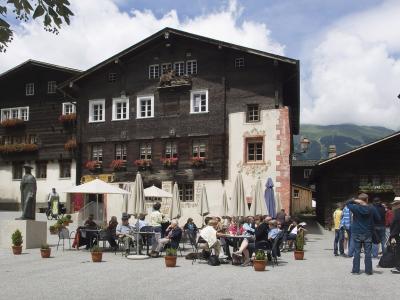 The old wooden houses around the village square of Ernen