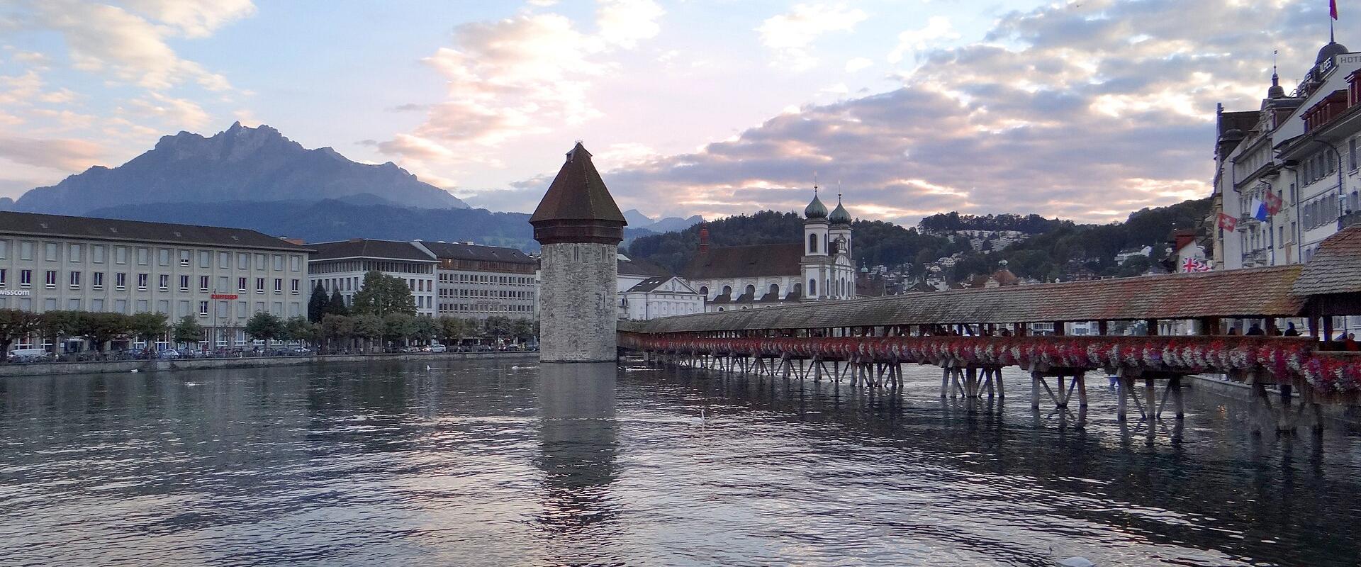 Lucerne's Chapel Bridge and old town on the Reuss, with Mount Pilatus behind
