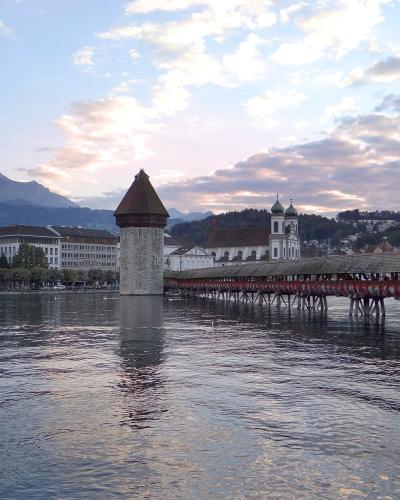 Lucerne's Chapel Bridge and old town on the Reuss, with Mount Pilatus behind