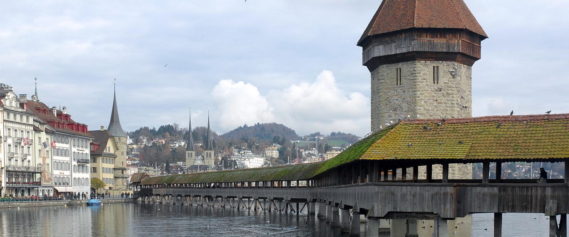Chapel Bridge and the octagonal Water Tower on the Reuss in Lucerne