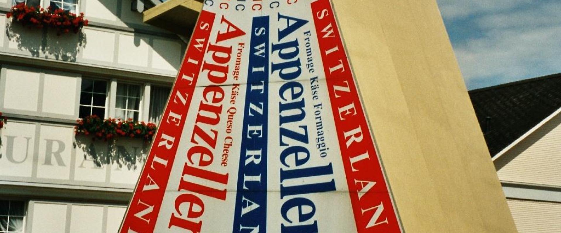 Giant Appenzeller cheese sign at the show dairy in Stein