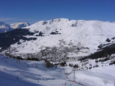 Verbier and its ski slopes in the Valais Alps under a clear winter sky