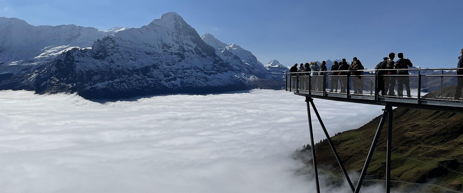 The First Cliff Walk viewing platform above the clouds, with the Eiger behind