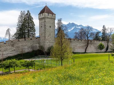 Towers and battlements of the medieval Musegg Wall above Lucerne