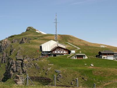 Männlichen top station on the grassy ridge above Grindelwald