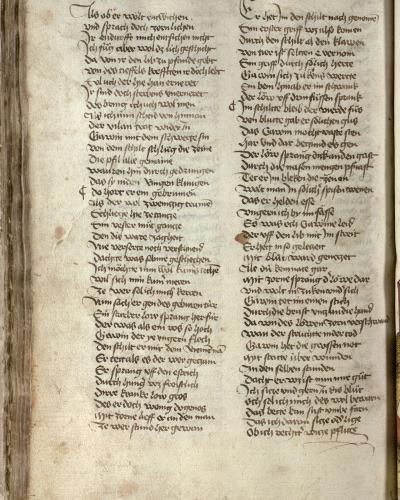 A two-page spread of a medieval manuscript written in Gothic script on aged parchment, with visible text columns and marginalia.